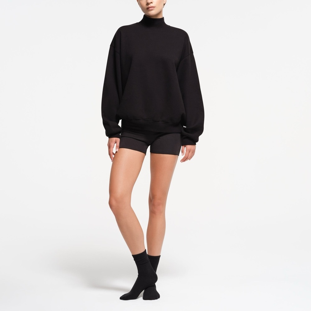 Skims Cotton Fleece Oversized Mock Neck Pullover in Onyx